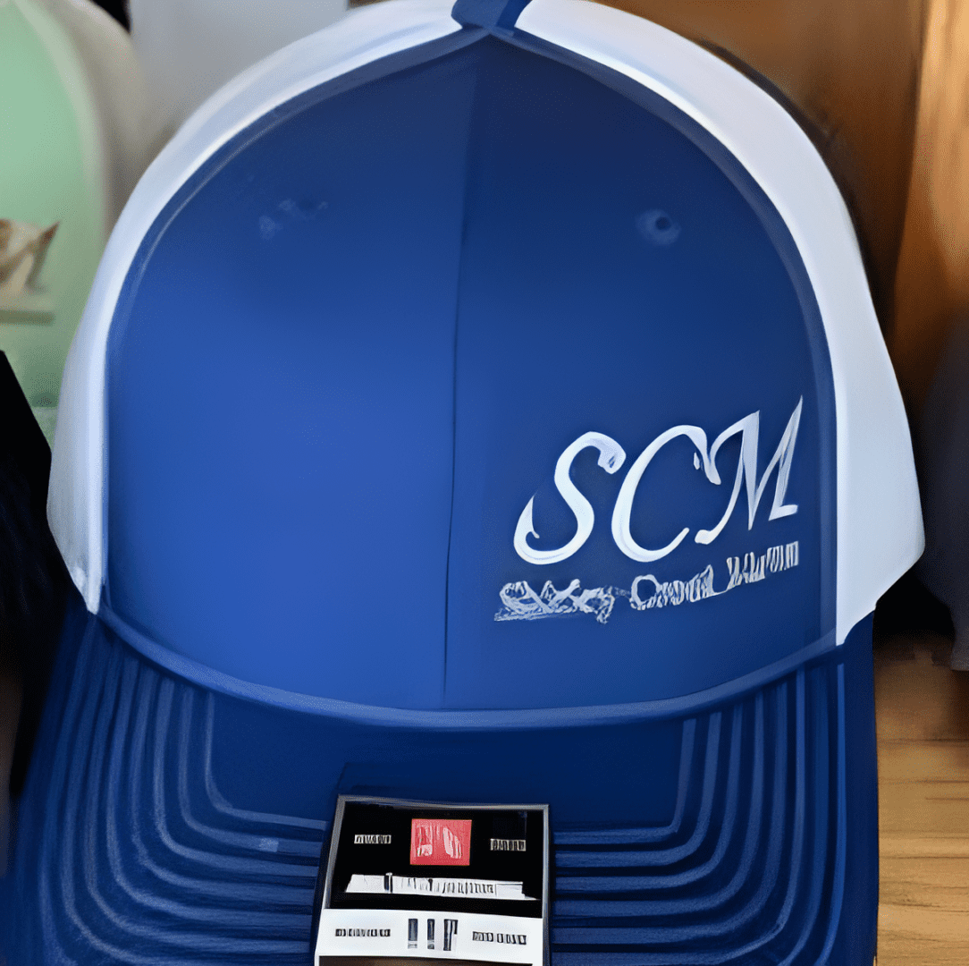 Blue cap with white embroidered letters