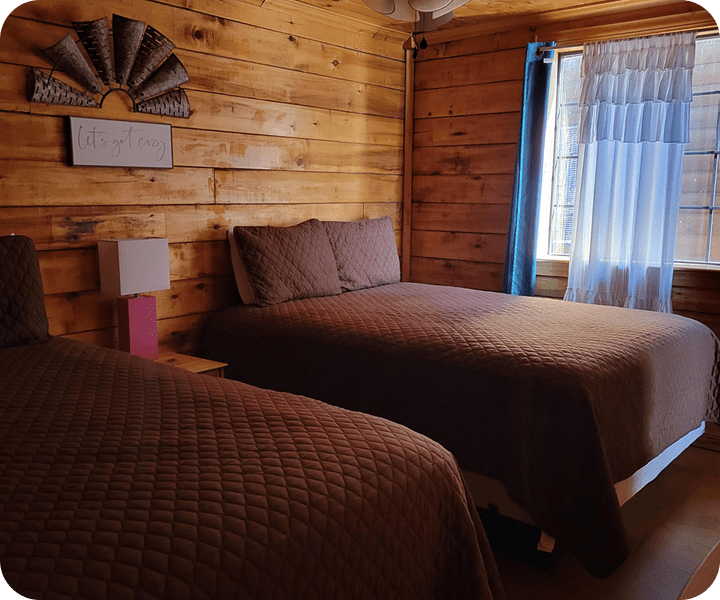Rustic bedroom interior with natural wood walls
